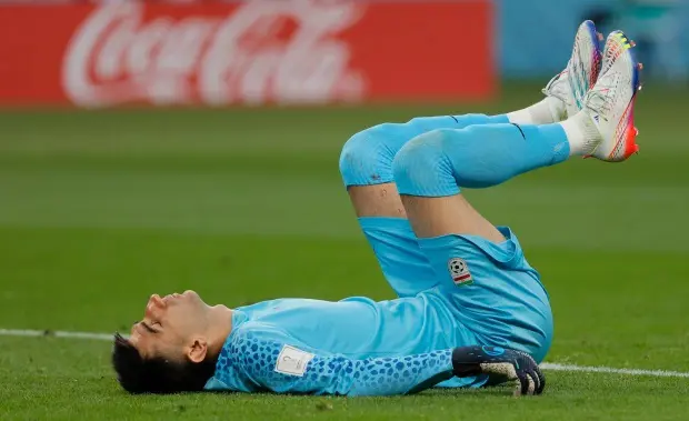 Ali Beiranvand is sporting a face mask since he was involved in a nasty collision with his teammate Majid Hosseini during Iran's 6-2 loss to England. 