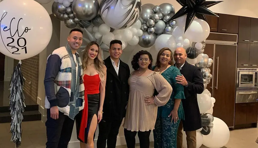 Correa with his mom dad and siblings on New Year's Eve.