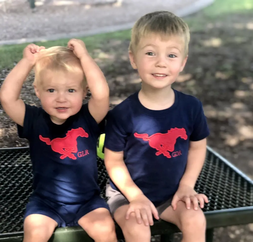 Garrett's young kids getting ready to cheer their father.