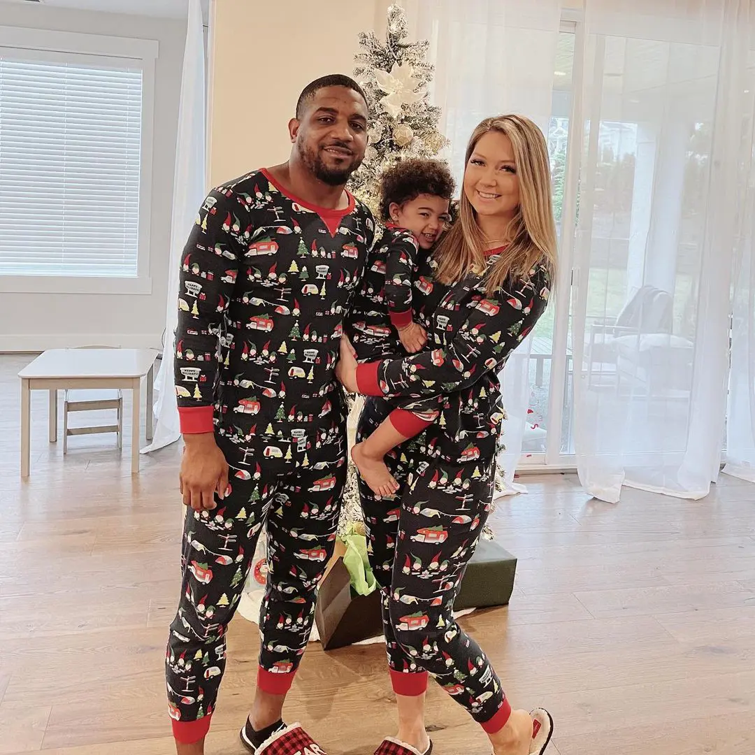 The family celebrated Christmas by wearing a matching cozy outfits.