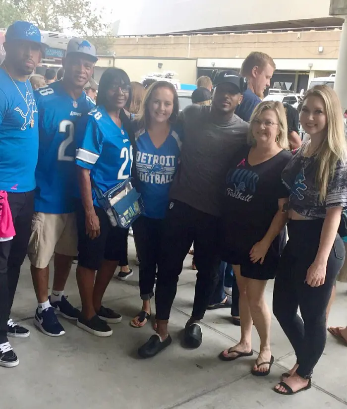 Quandre and Abby with their family and friends watched Football game at Superdome