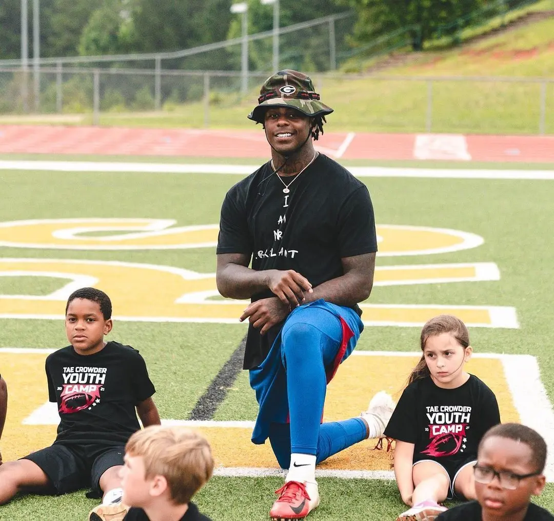 Tae Crowder at Pine Mountain, Georgia in youth camp motivating and playing with the community children.