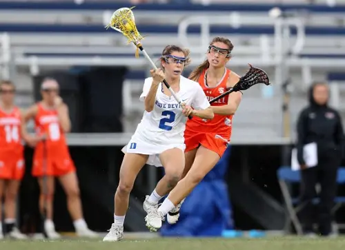 Daniel Jones girlfriend Ella Bonafede in action for the Dukes lacrosse team, Duke Blue Devils