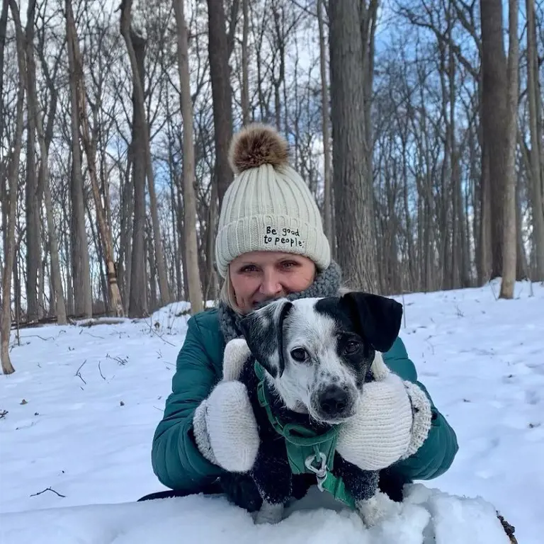 Kim holding Shannon's dog Milo. 