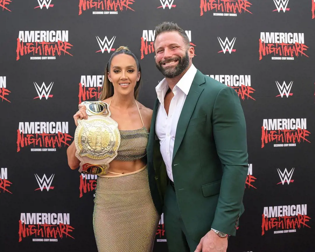 Green (left) alongside her husband Matt Cardona at the Cody Rhodes premier of American Nightmare, she is the current WWE tag team champion