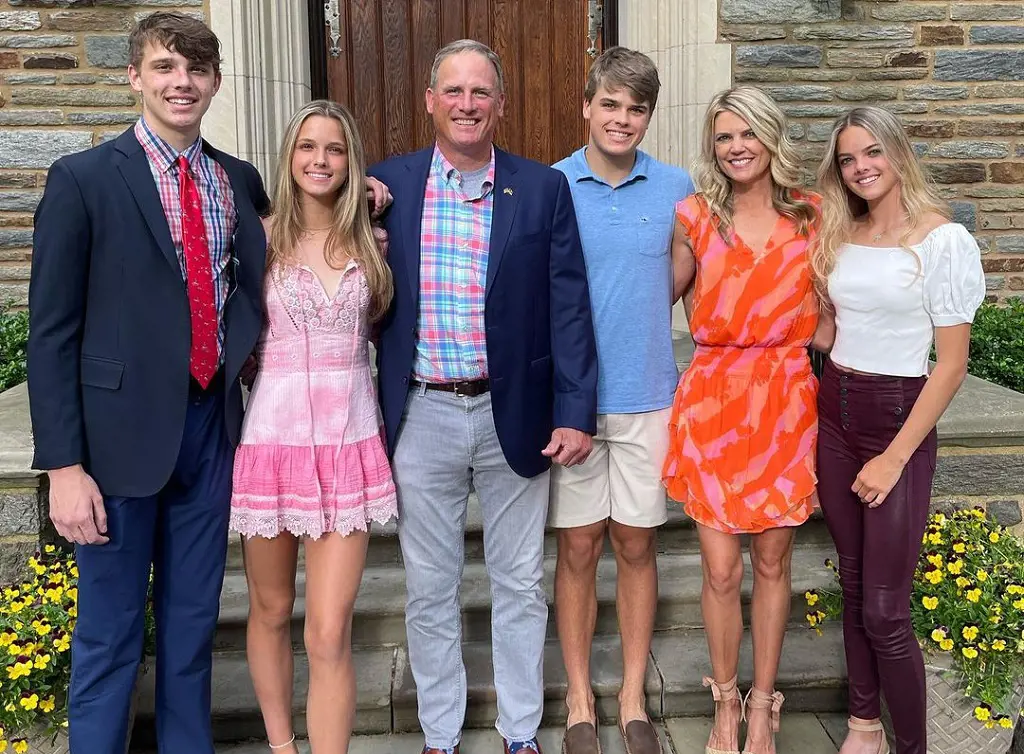 Melissa with her spouse and kids, attending the graduation ceremony of her son, Mike from St. Andrew's School in May 2022