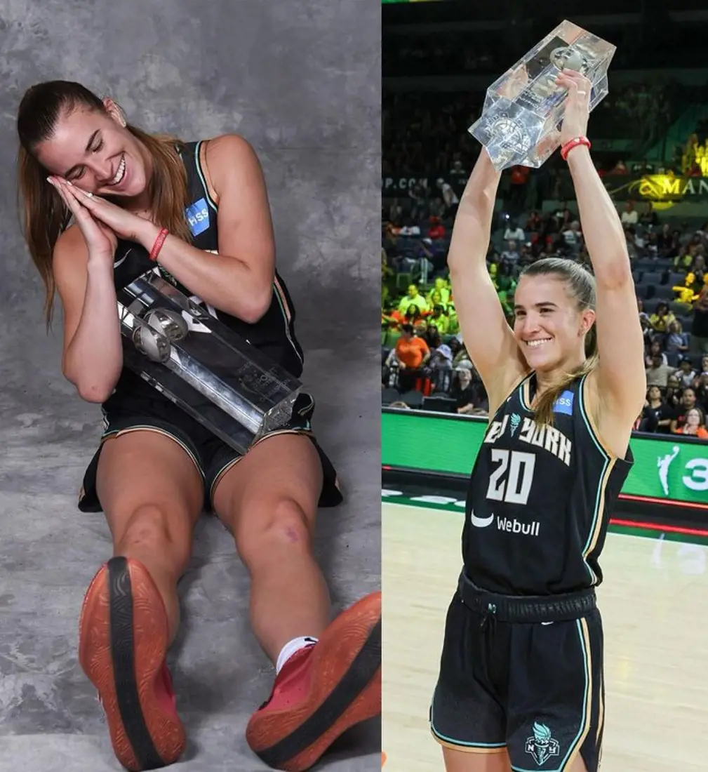 Sabrina Ionescu with her 3 point champion trophy 