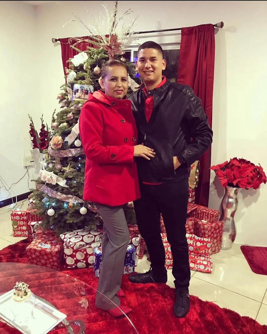 Mary and Javier celebrating Christmas together. 