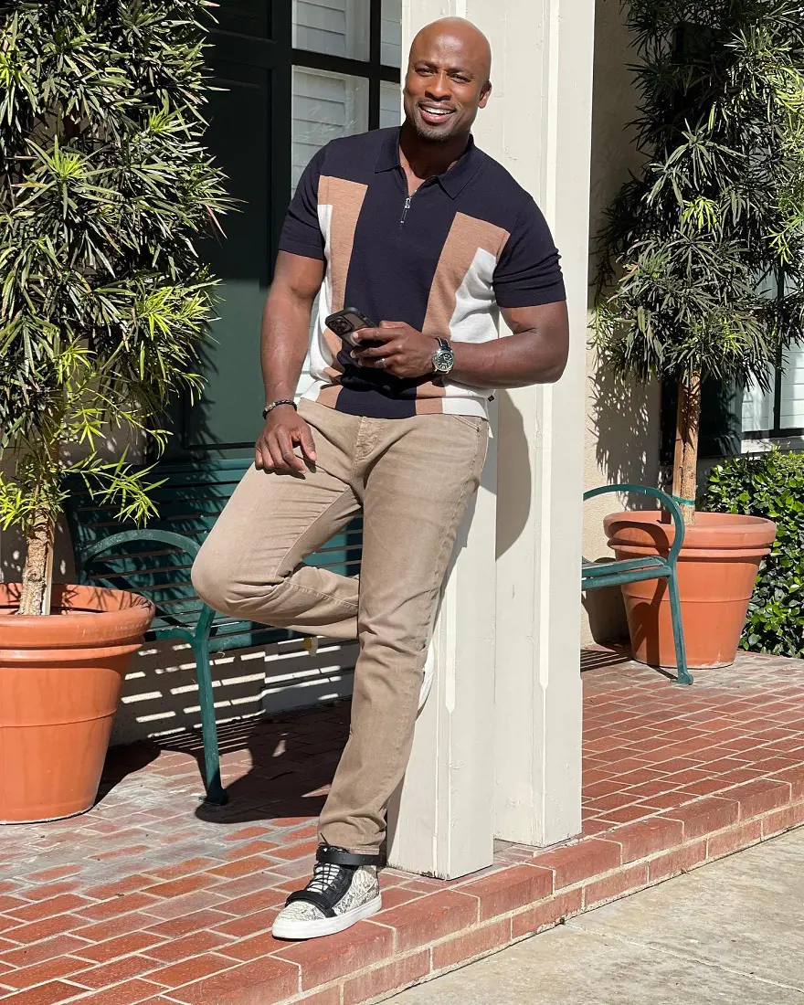 Gbaja-Biamila in a nice fit outfit enjoying the sun in January 2023