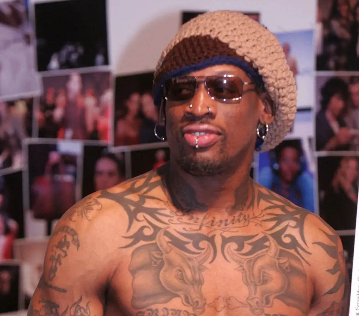 Dennis Rodman shows off his incredible bodyart.