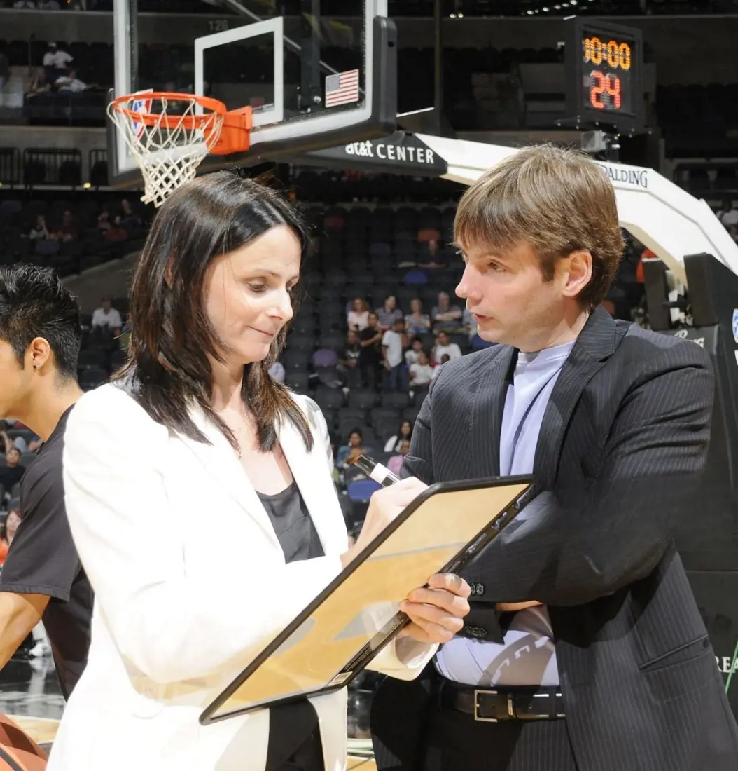 Sandy and Olaf chat during a game in July 2010