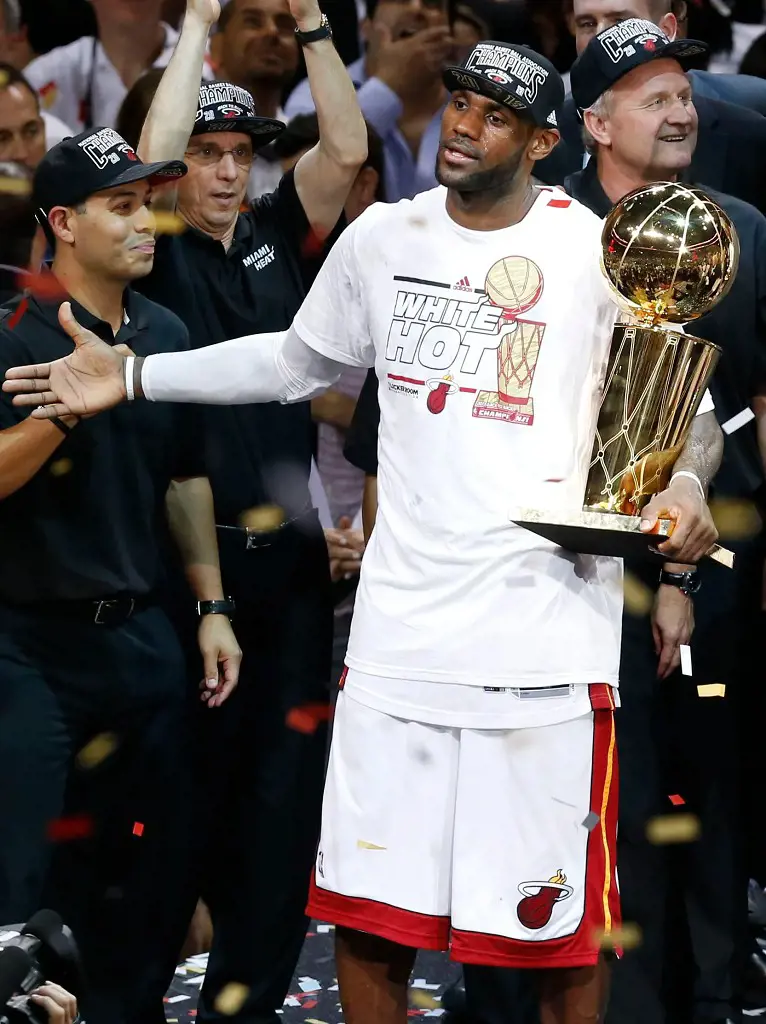 James clutching the championship trophy in 2013