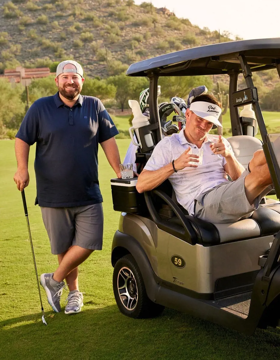 Colt Knost (L) with Drew Stoltz chilling on golf course in July 2022