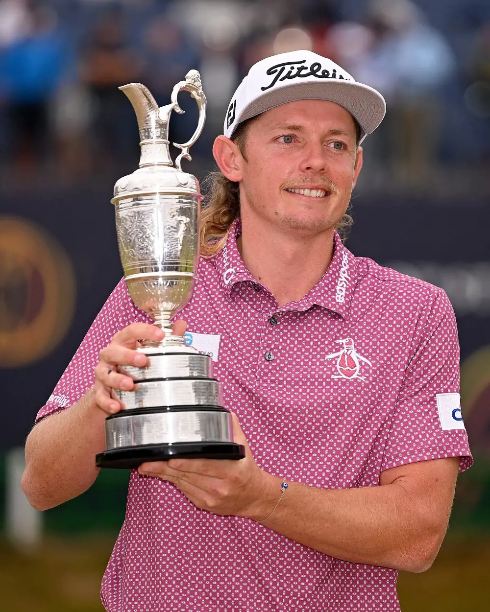 Cam Smith lifting the 2022 Open Championship trophy.