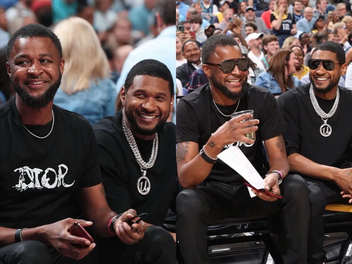 Tee laughs with famous American singer Usher as they watch Ja's game in Memphis, Tennessee, April 2022