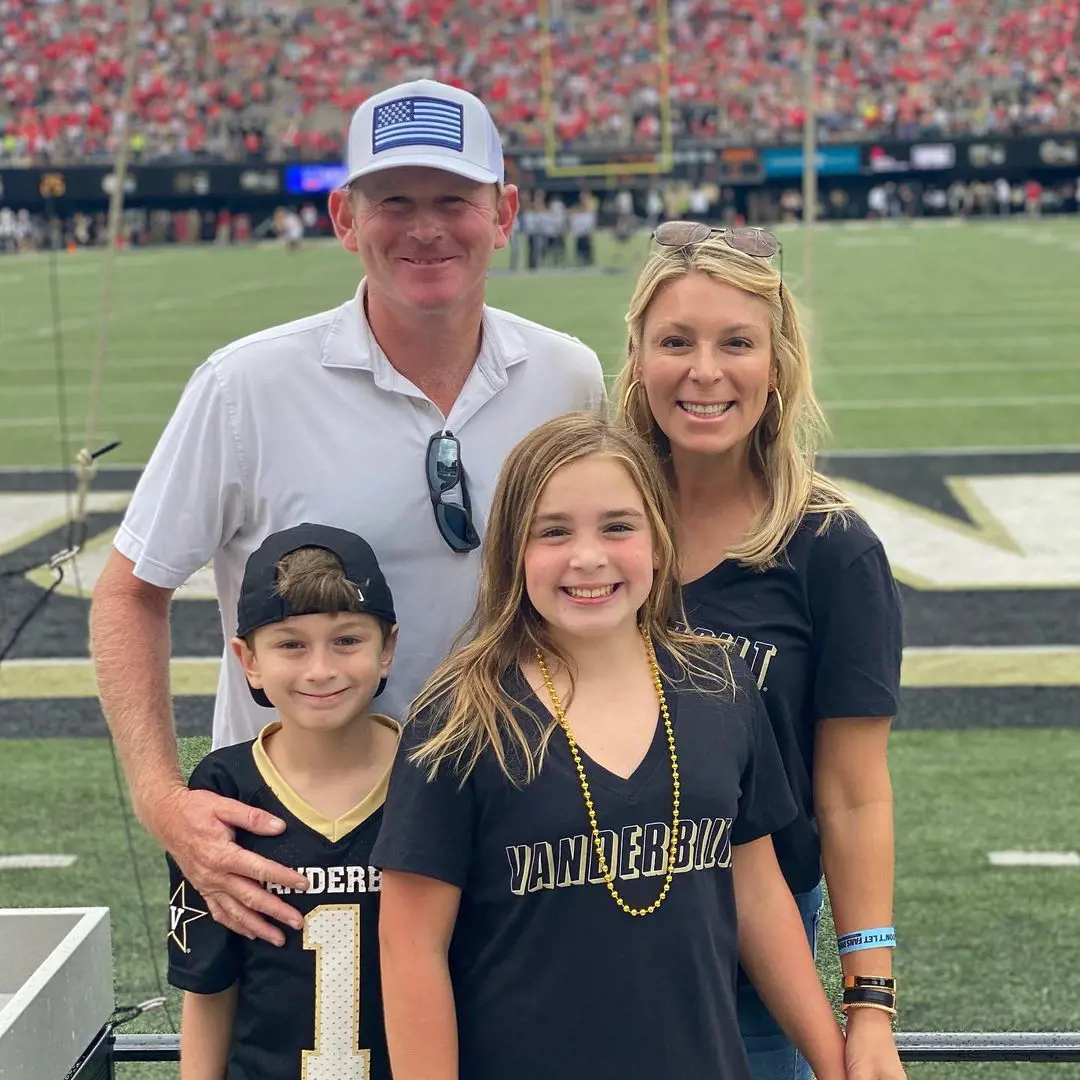 Snedeker celebrating with his kids and family in father's day in an NFL stadium