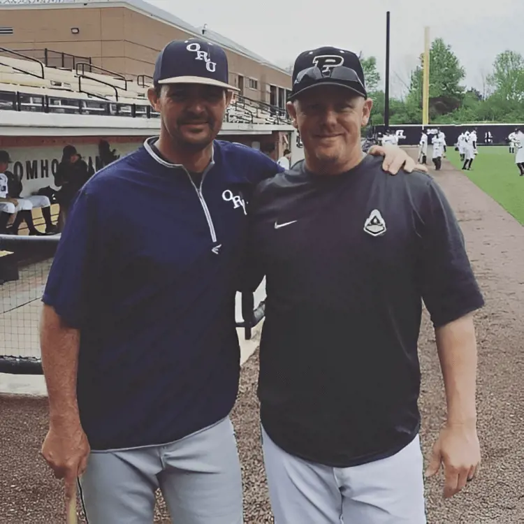 Ryan Neill with former ORU teammate Steve Holm. 