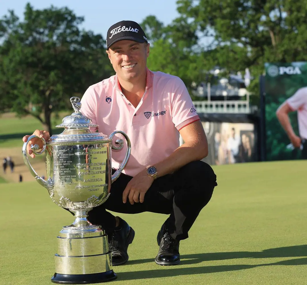 Thomas clutching his 2022 PGA Championship at Southern Hills Country Club