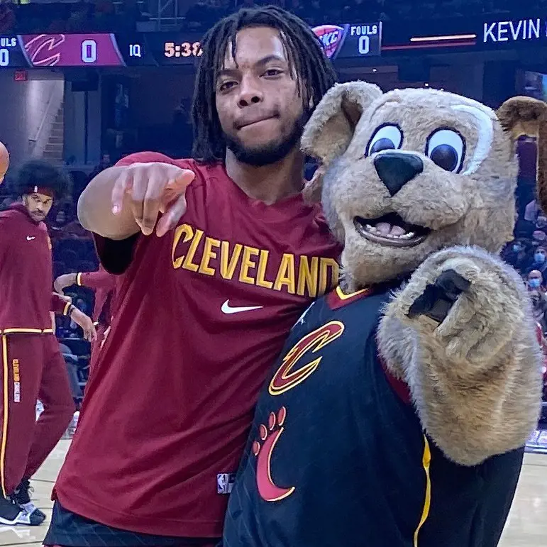 Cleveland Cavaliers' masoot Moondog with the NBA star Darius Garland  at Rocket Mortgage FieldHouse. 