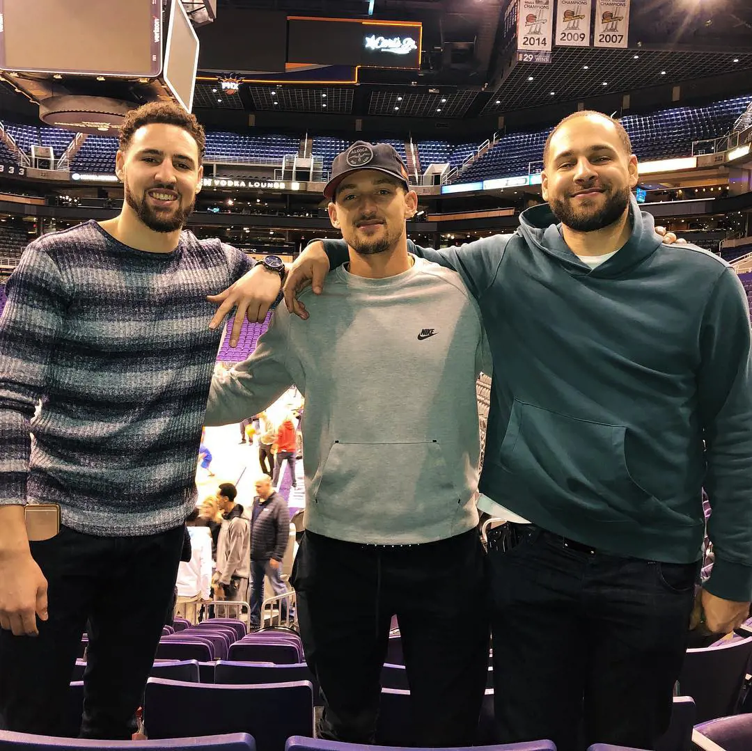 Trayce (middle) with Klay (left) and Mychel together during an NBA game in February 2019