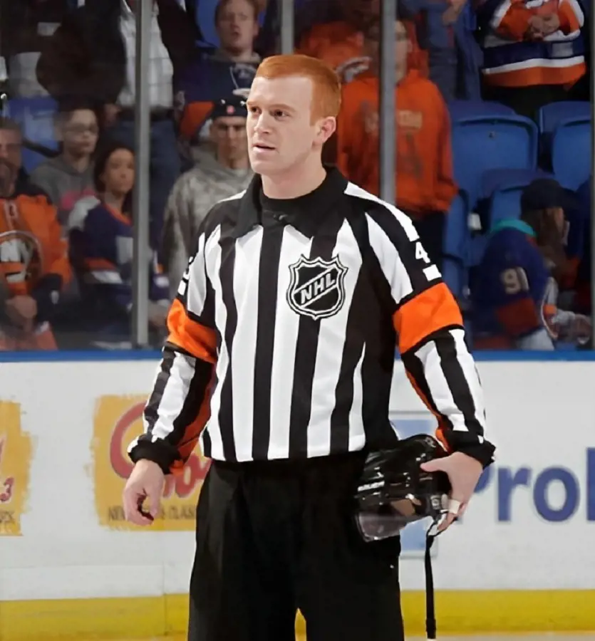 Kelly Sutherland officiating the game on February 17, 2021