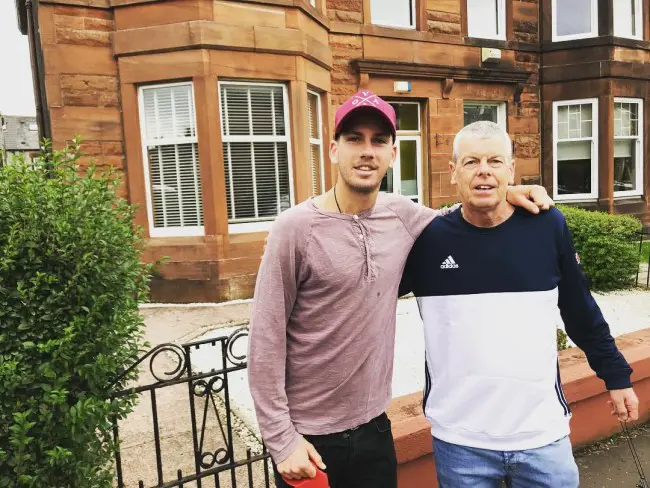 Cameron with his father in front of Voila Store at Queen's Park, Glasgow in September 2018.