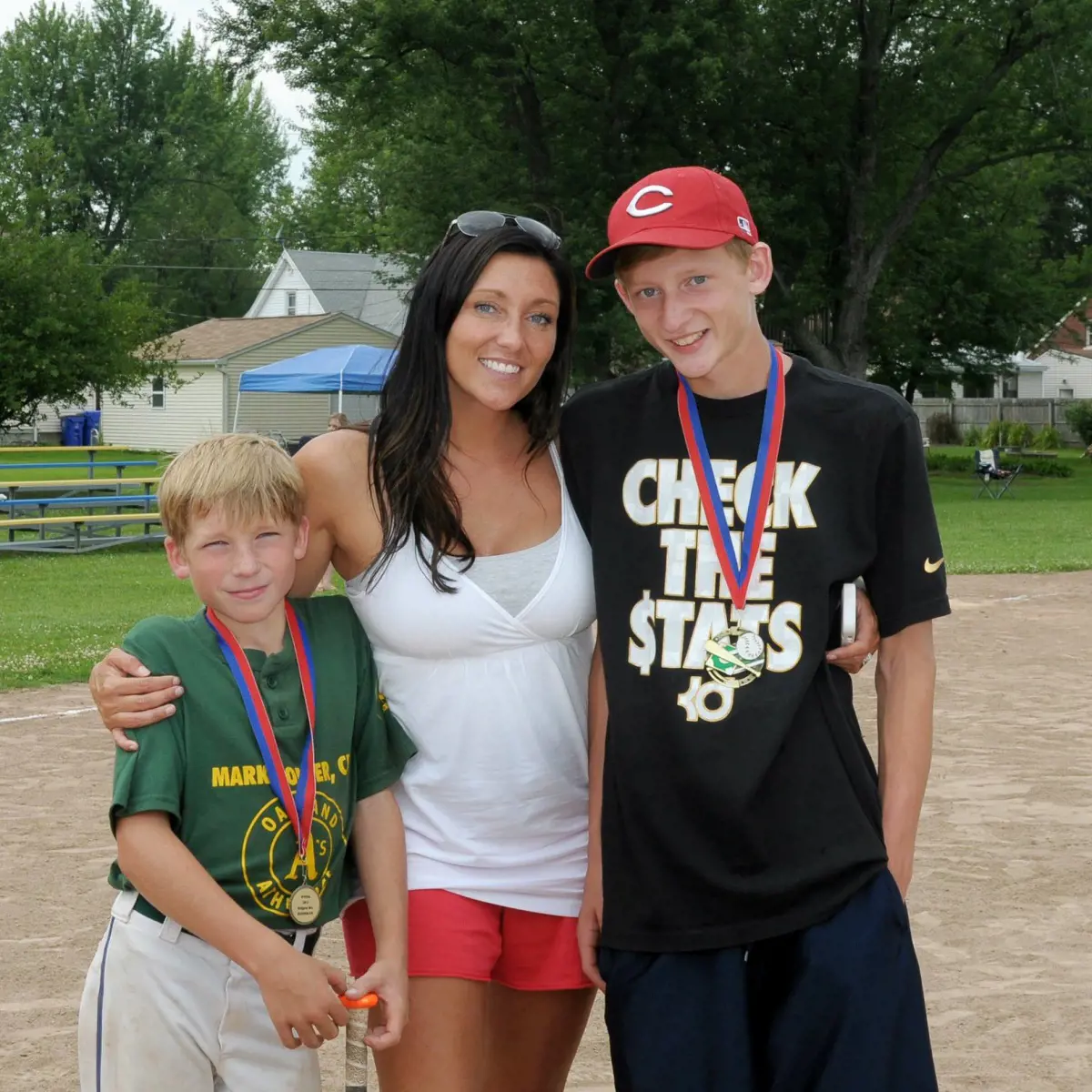 Mark and Adien's childhood photo with their mom from 2014.