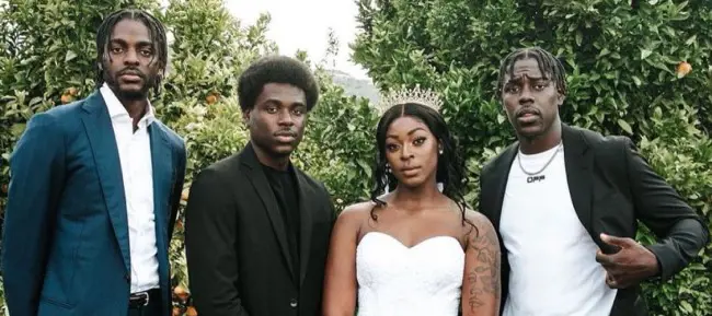 Jrue with his sister Lauren, and two brothers Aaron and Justin Holiday.