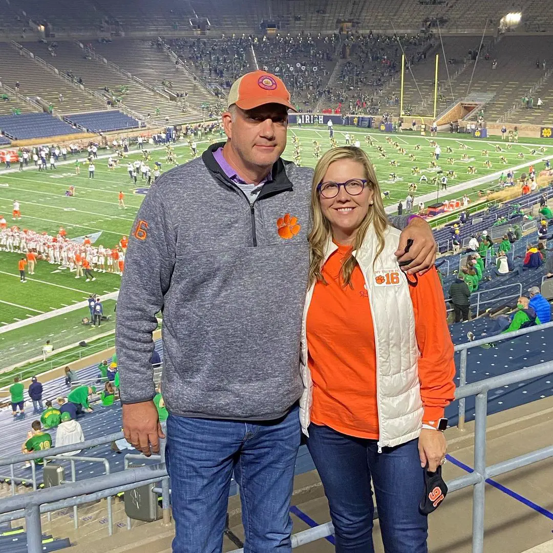 Amanda and Jeremy Lawrence cheering for their son during his football match 