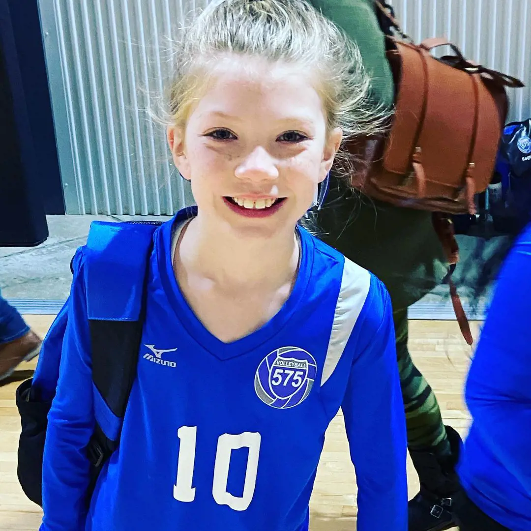 Olivia in her 575 volleyball jersey, playing her first volleyball tournament in January 2021