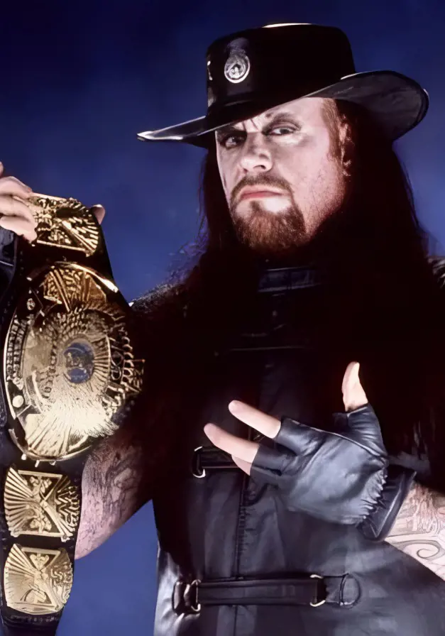 The Undertaker with the WWE belt on March 2, 2019.