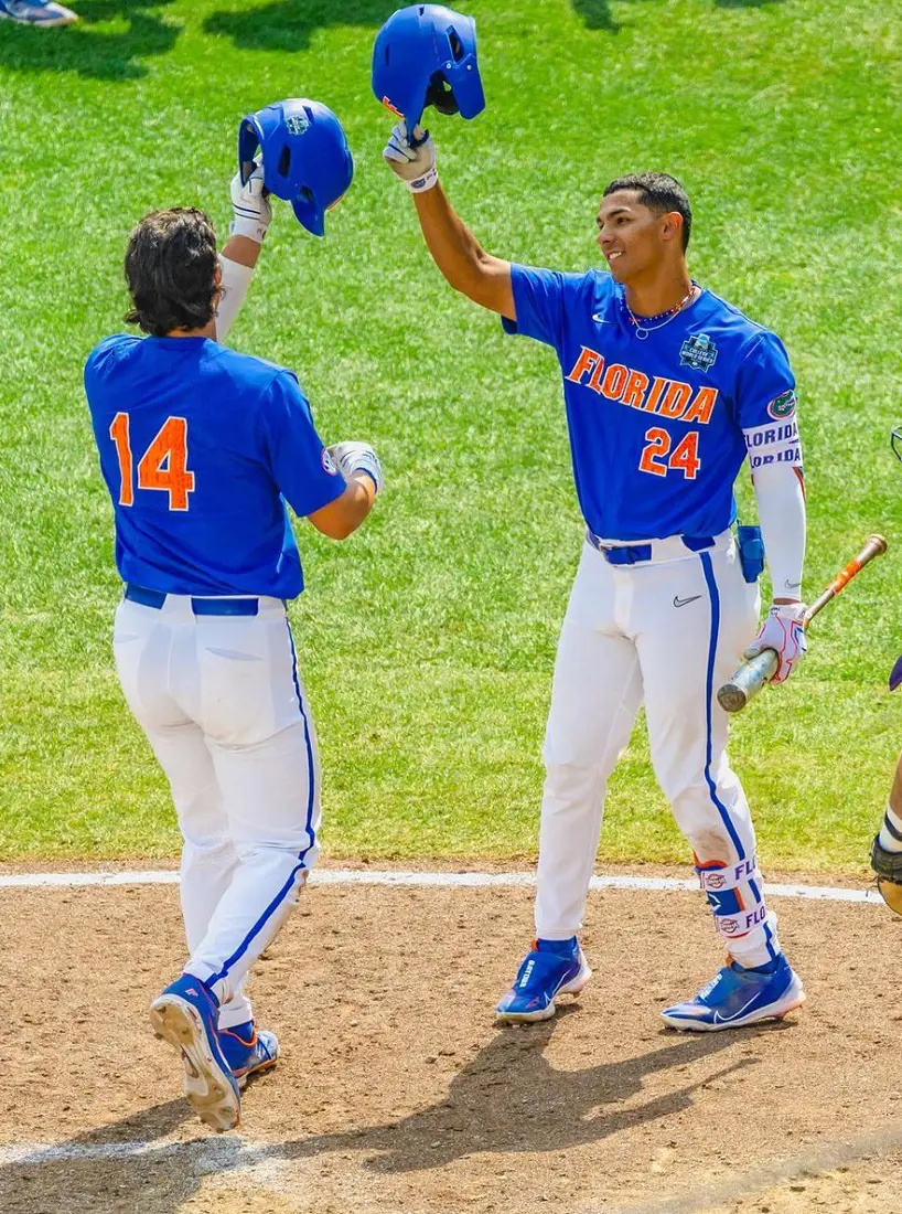 Gators Team celebrates after a historic win against LSU on June 25, 2023