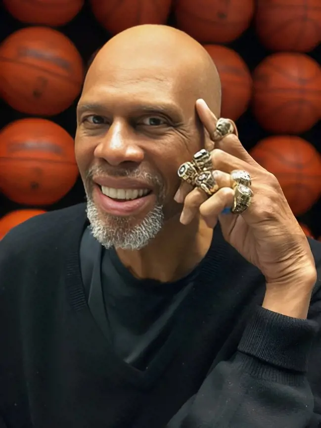 Kareem Abdul-Jabbar has 6 NBA championships and 3 NCAA titles making him one of the most decorated players