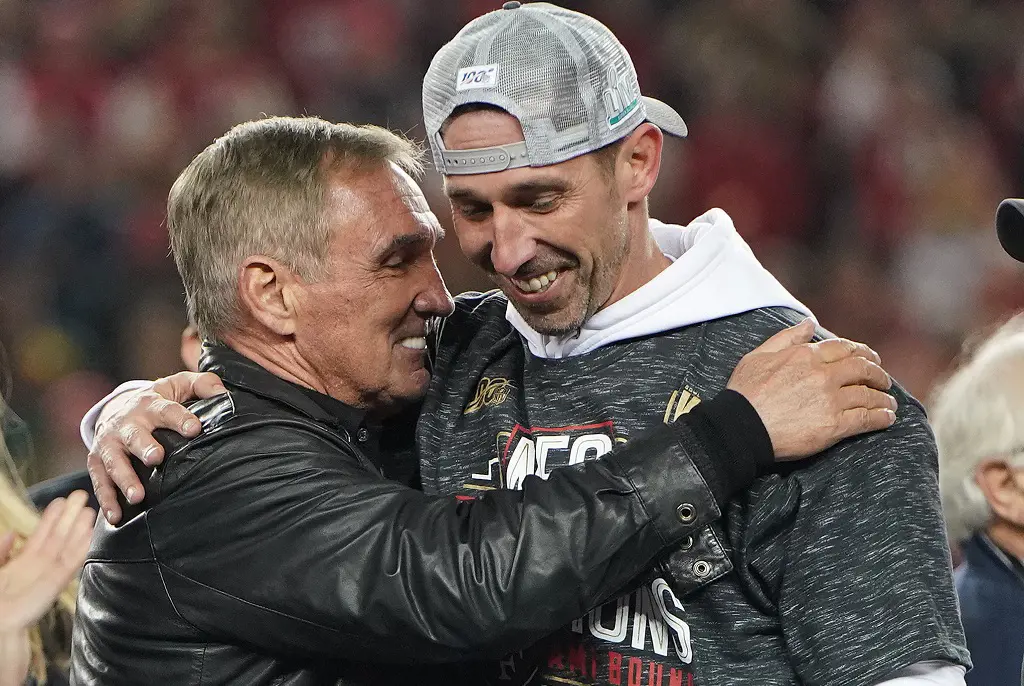 The Shanahan father-son duo embracing on the NFL grounds in 2020.