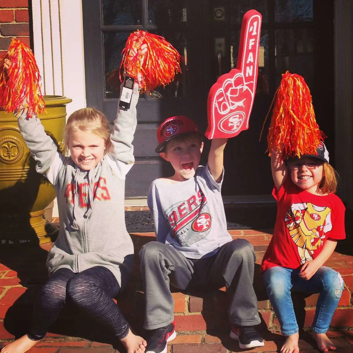 Carter, Lexi, and Stella on their way to cheer for the 49ers as a team in 2018.