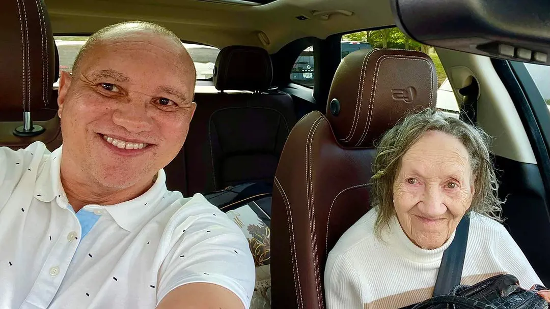 Robert going on ride with his mother.