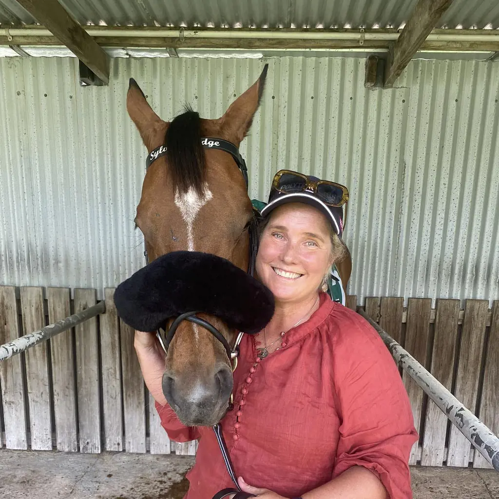 Kelly with her horse at Sylvan Lodge equine centre in December 2022