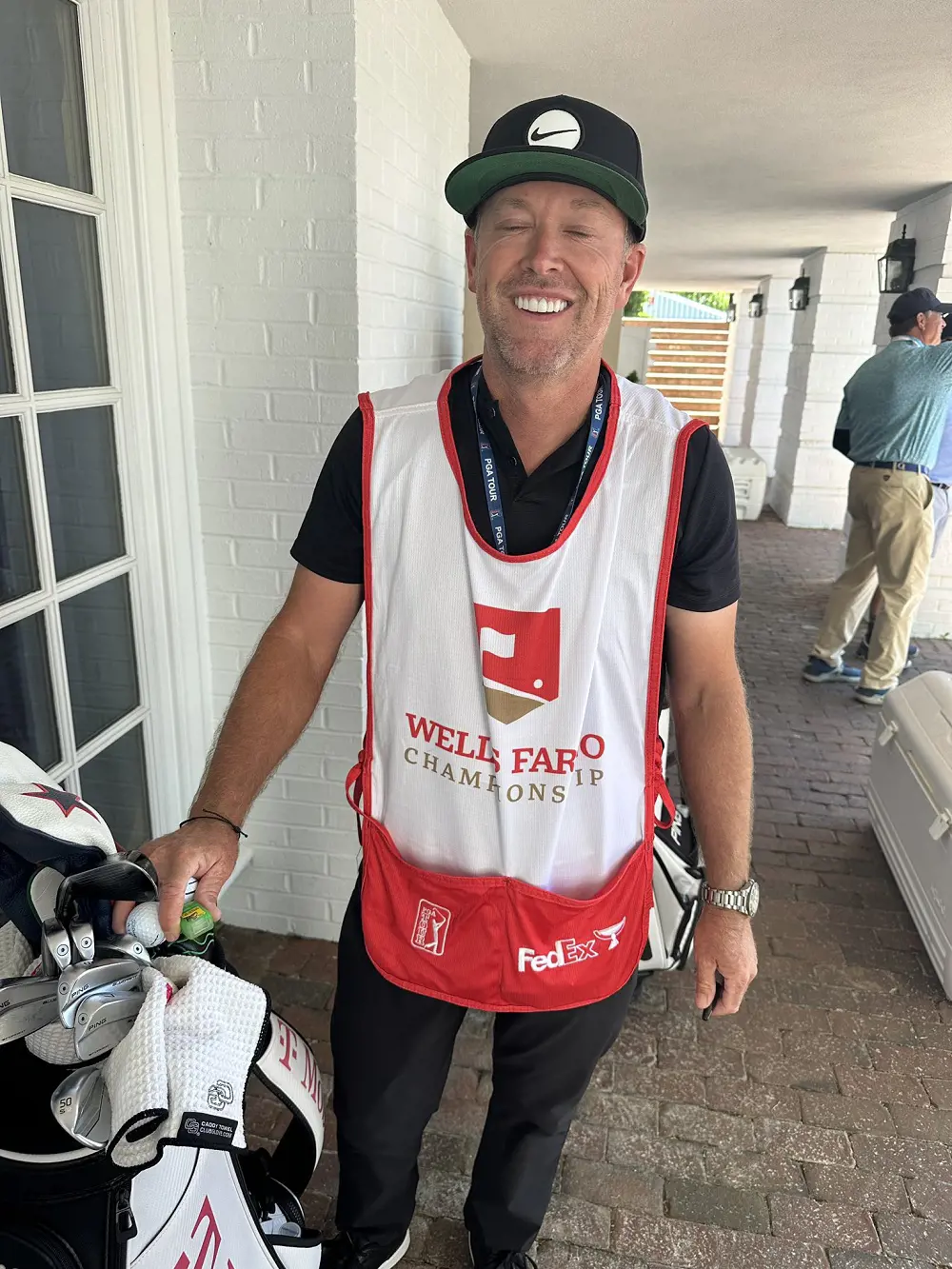 Versatile instructor Boyd serves as a caddie for both Preston and Tony Finau.