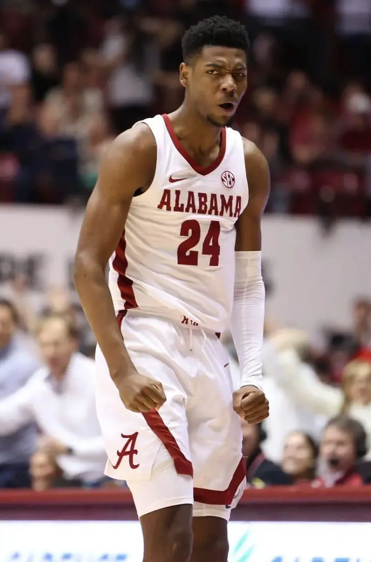 Miller celebrates after finding the net while playing for the Crimson Tide in 2022