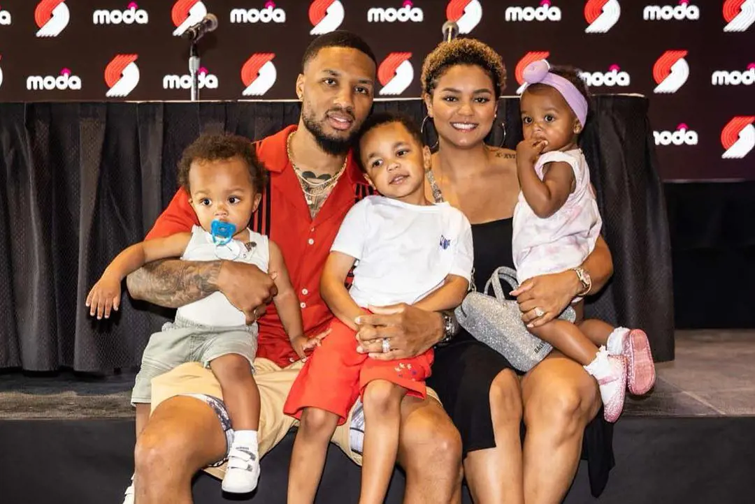 Lillard and Hanson posing for a portrait during the NBA signing 