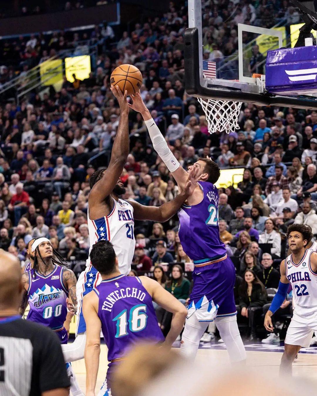 Utah Jazz player Walker Kessler blocking Philadelphia 76ers player's attempt to basket at Vivint Arena in January 2023