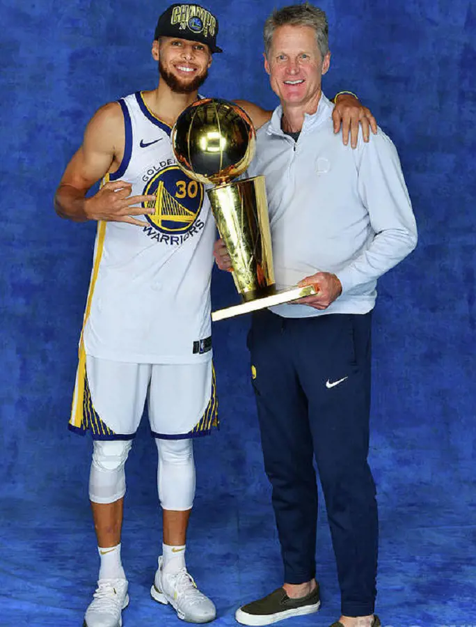 Kerr with Curry after clinching the 2015 NBA crown