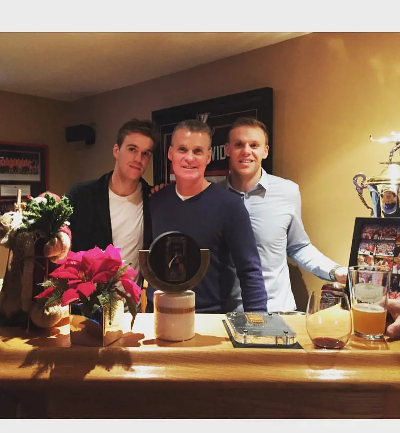 Connor and Cameron McDavid celebrate Christmas with their father in 2017.