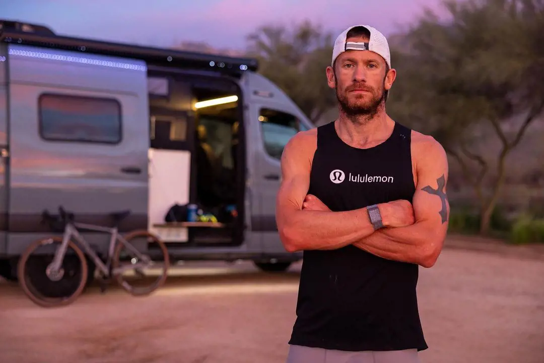 Sanders promoting his Lululemon wear training outdoors. He is a tri-athlete who has competed in Ironman