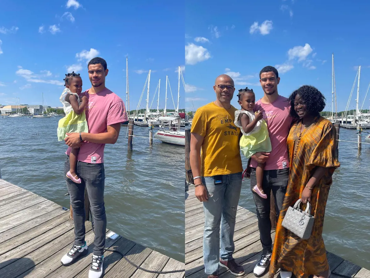 Olivier holds Zuri while with Christian and Belle in Annapolis, Maryland, May 2022