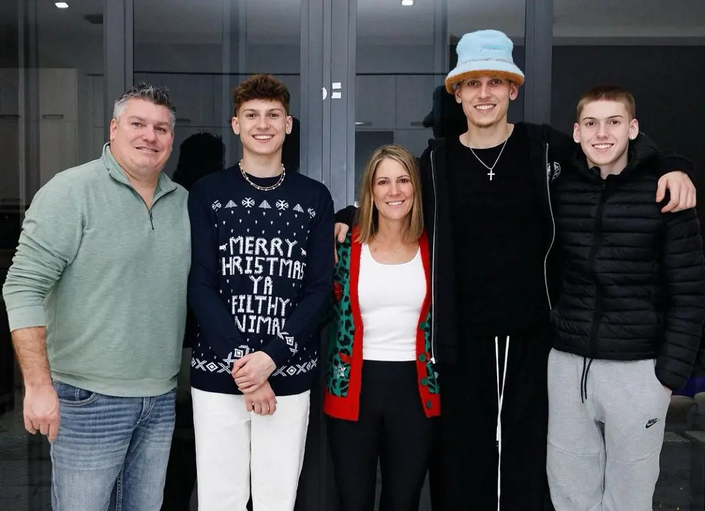 Tyler celebrating Christmas with his family, (from the left), Chris, Austin, Jen and Myles