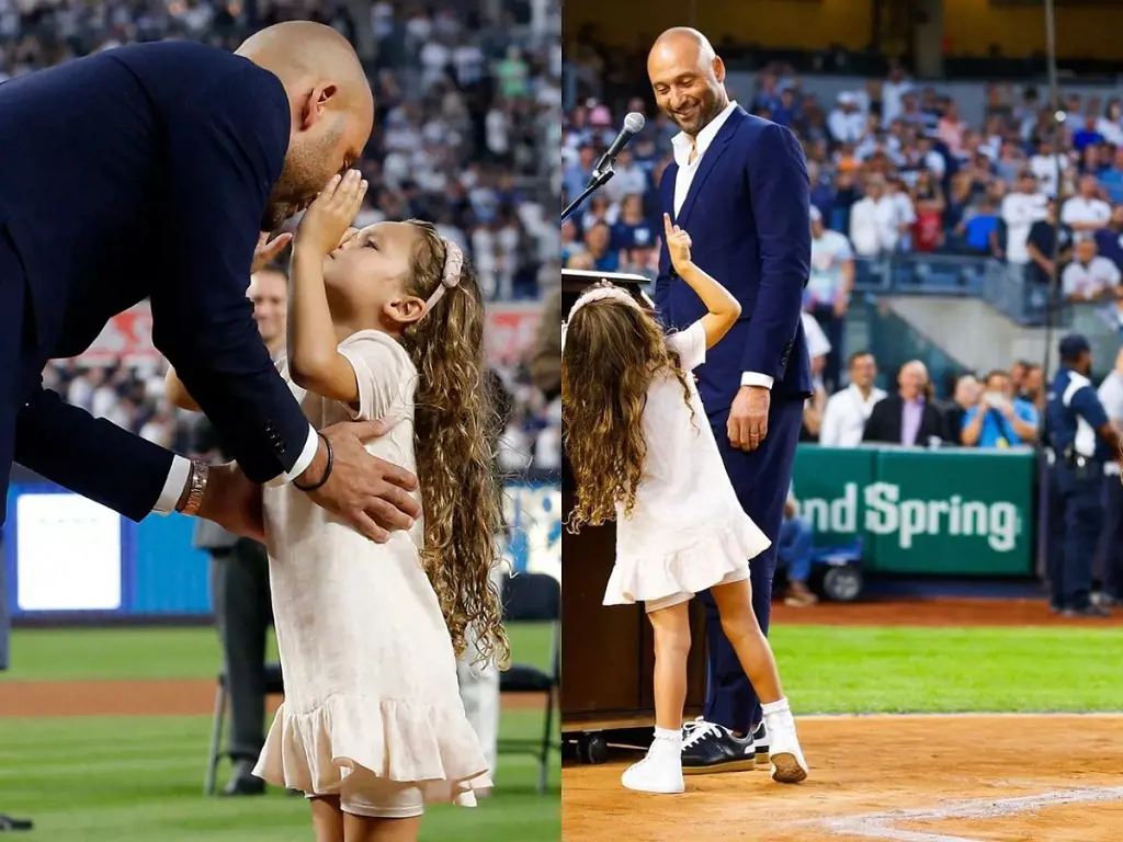 Bella looking happy at Yankee Stadium with Derek. 