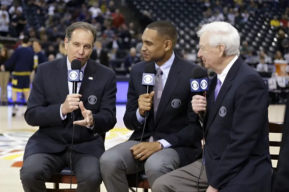 Jim Nantz (left), Grant Hill (center), and Bill Raftery (right) pictured together during a broadcast