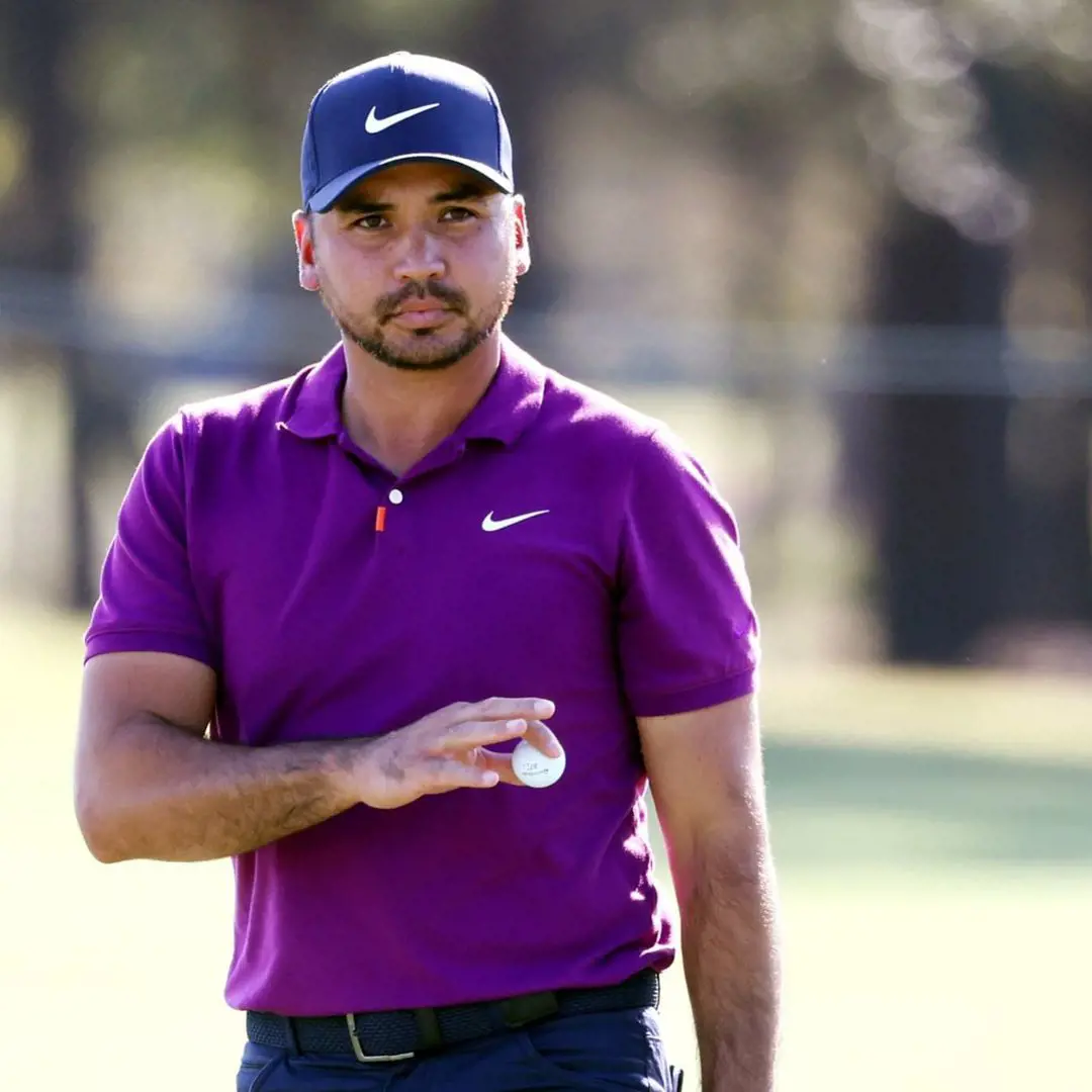 Jason clutching golf ball at Cadence Bank Houston Open in Texas