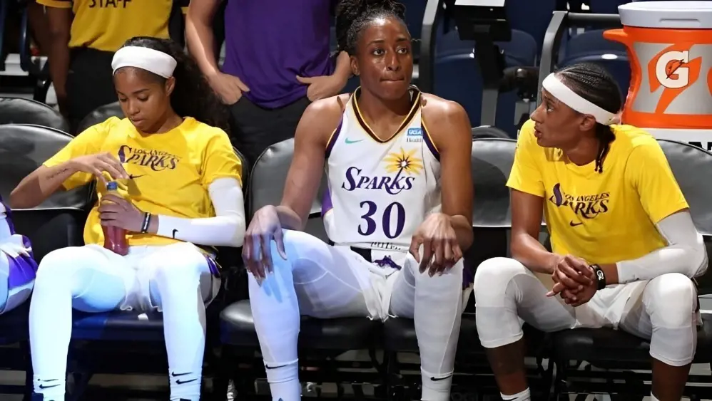 Players of the Los Angeles Sparks on the sidelines during a game